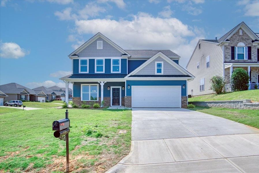 Front exterior of a new home in Larkin, Statesville, NC, highlighting curb appeal (Image 1). Front exterior of a new home in Larkin, Statesville, NC, highlighting curb appeal (Image 1).