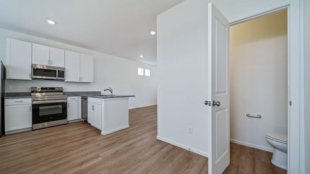 Furnished interior view inside a new home in Reunion, Commerce City (Image 6).
