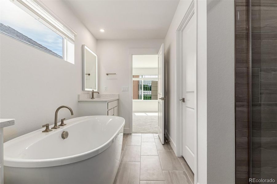 Furnished interior view inside a new home in Ascent at Inverness, Englewood (Image 3).