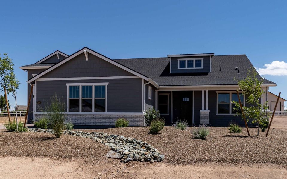 Front exterior of a new home in Heritage Pointe, Chino Valley, AZ, highlighting curb appeal (Image 24).