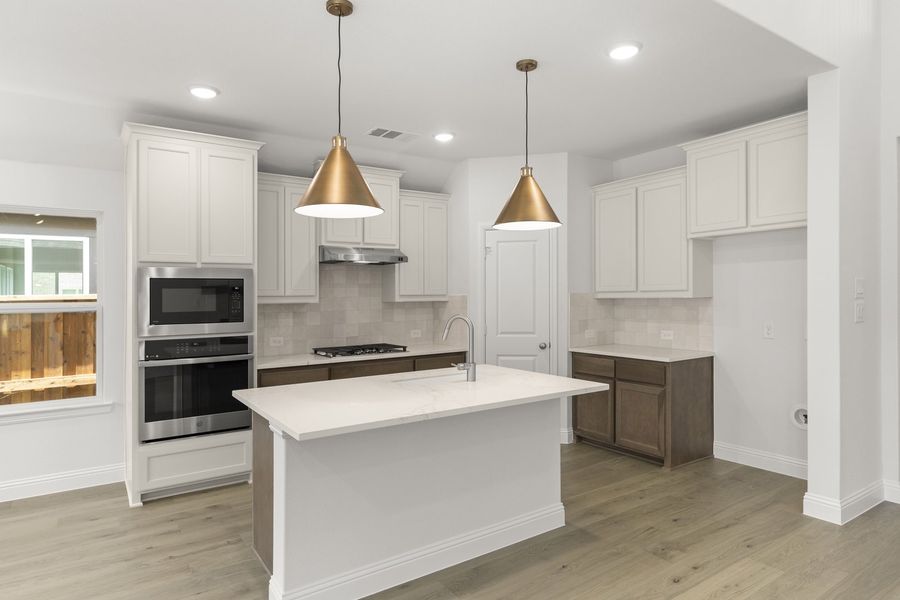 Furnished interior view inside a new home in The Reserve at Spiritas Ranch, Little Elm (Image 9).