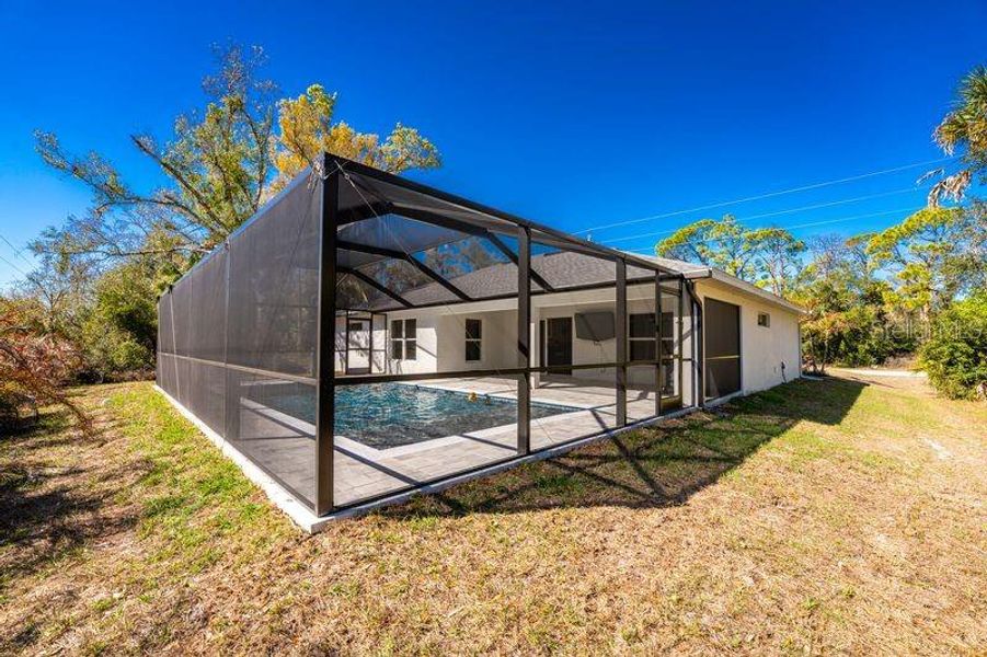 Exterior details and patio area of a home in , Port Charlotte (Image 22).