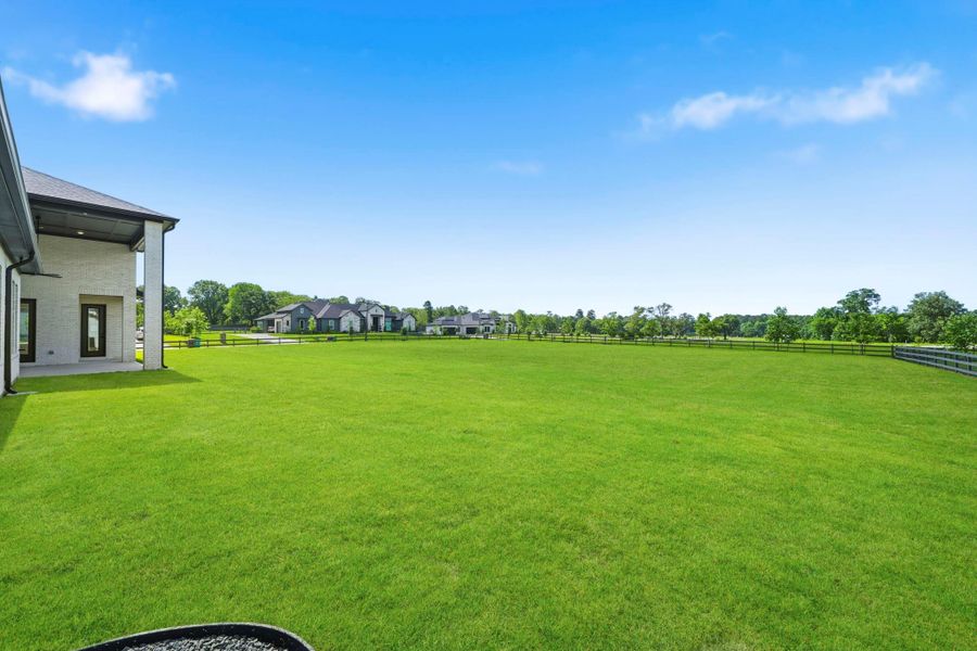 Exterior details and patio area of a home in Bentwood Farms, Montgomery (Image 3). Exterior details and patio area of a home in Bentwood Farms, Montgomery (Image 3).