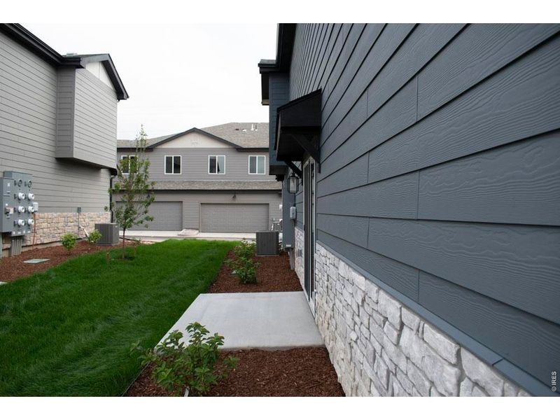 Exterior details and patio area of a home in Northridge Trails Townhomes, Greeley (Image 14).