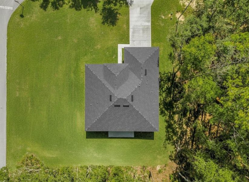 Front exterior of a new home in , Citrus Springs, FL, highlighting curb appeal (Image 18).