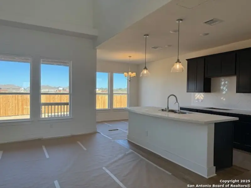 In-progress construction of a new home in Megan's Landing 70', Castroville, TX (Image 7).