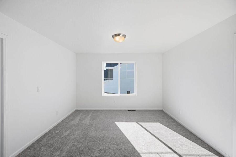 Spacious, unfurnished interior of a new home in The Town Collection at Independence, Elizabeth (Image 14).