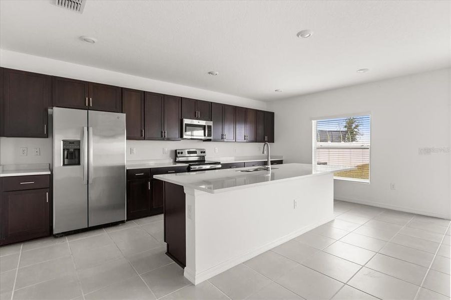 Furnished interior view inside a new home in Parkside at Cherry Lake, Groveland (Image 9). Furnished interior view inside a new home in Parkside at Cherry Lake, Groveland (Image 9).