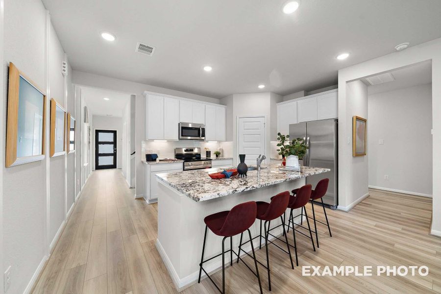 Furnished interior view inside a new home in Caney Creek Place, Conroe (Image 8).