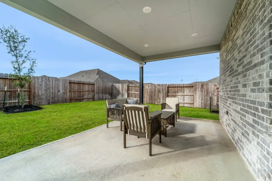 Exterior details and patio area of a home in Bay Creek, Baytown (Image 2).