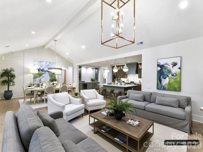 Great room, dining and view of kitchen