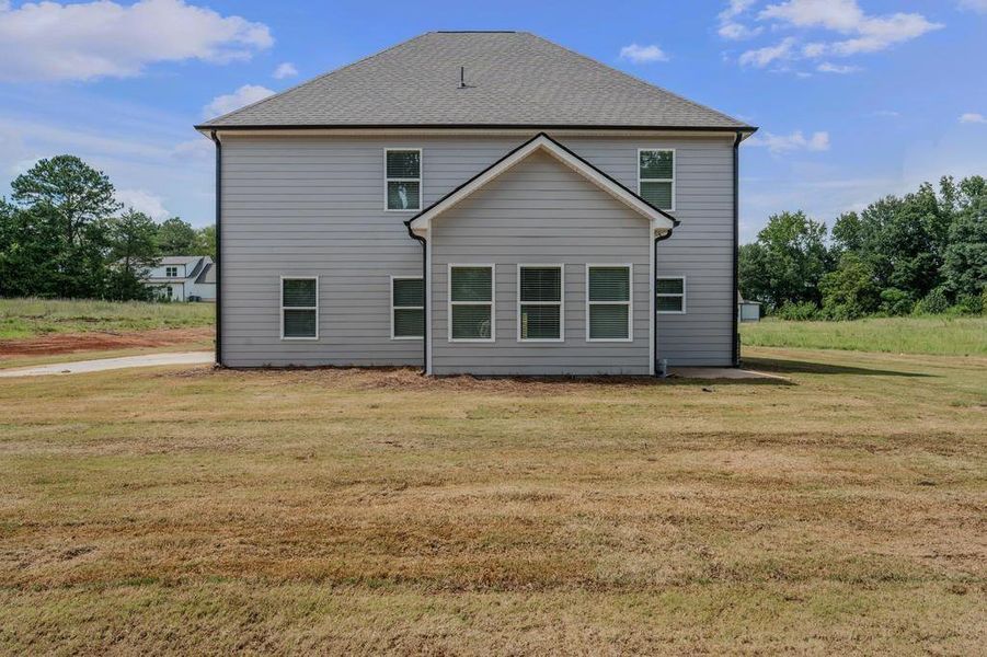 Front exterior of a new home in , McDonough, GA, highlighting curb appeal (Image 17).