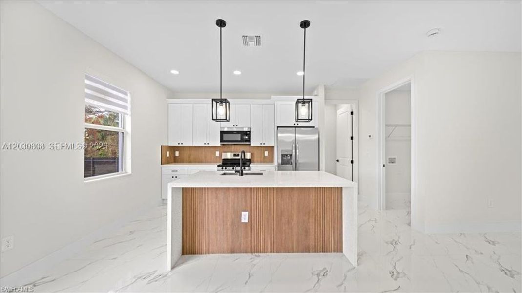 Furnished interior view inside a new home in , Lehigh Acres (Image 10).