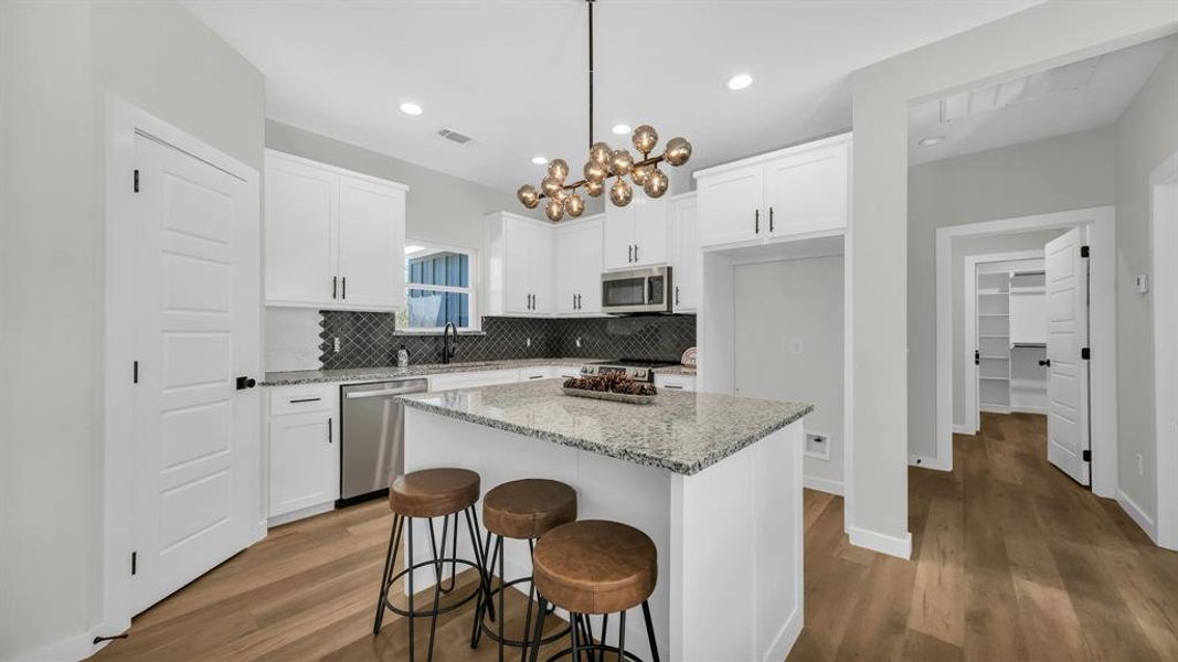 Furnished interior view inside a new home in Parallel Pastures, Poolville (Image 13).