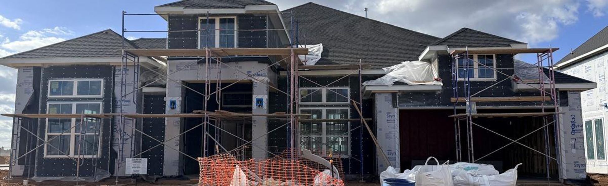 In-progress construction of a new home in Harvest Green 75′, Richmond, TX (Image 4).
