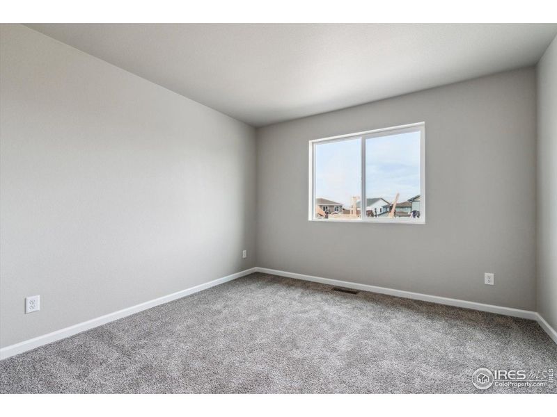 Spacious, unfurnished interior of a new home in Parkway at Prairie Center Village, Brighton (Image 16).