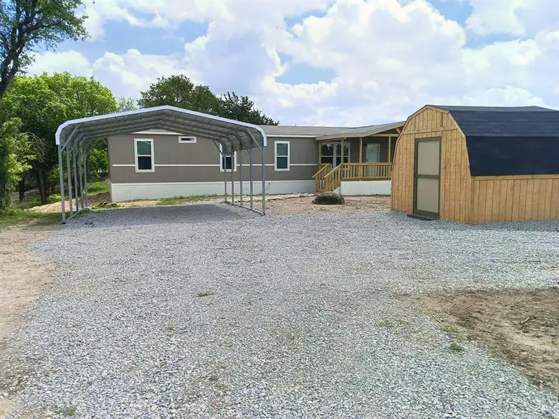 Exterior details and patio area of a home in , Springtown (Image 13).