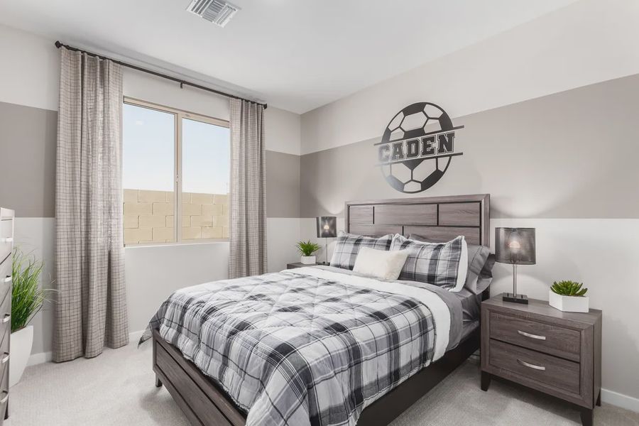 Representative furnished interior of a home built from the 2326 by Elliott Homes in Acacia at Santana, Yuma (Image 39).