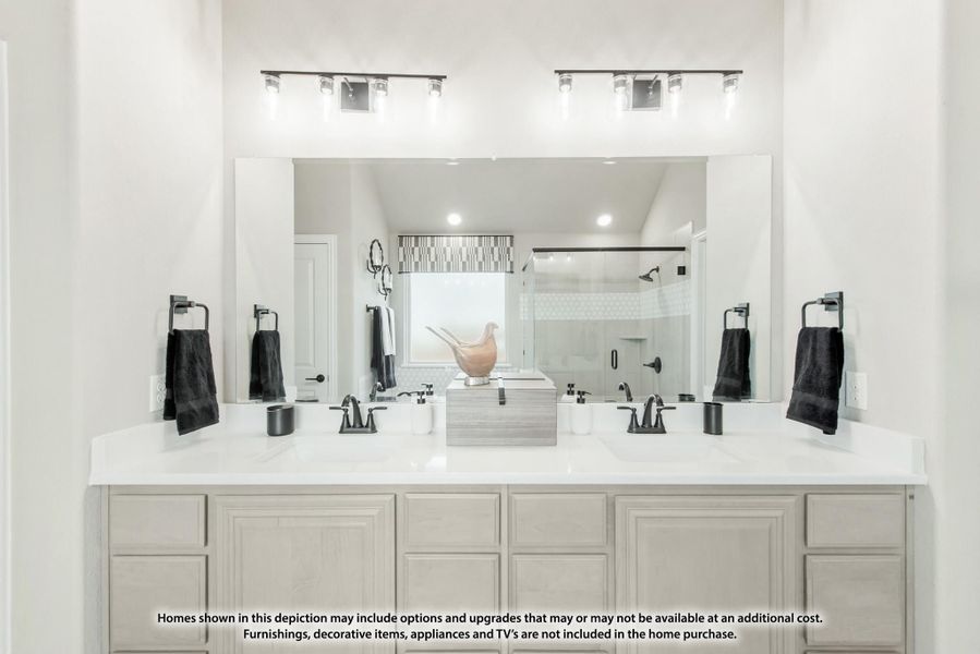 Bathroom with double vanity, white countertops, gray cabinets, large mirror, and black fixtures Bathroom with double vanity, white countertops, gray cabinets, large mirror, and black fixtures