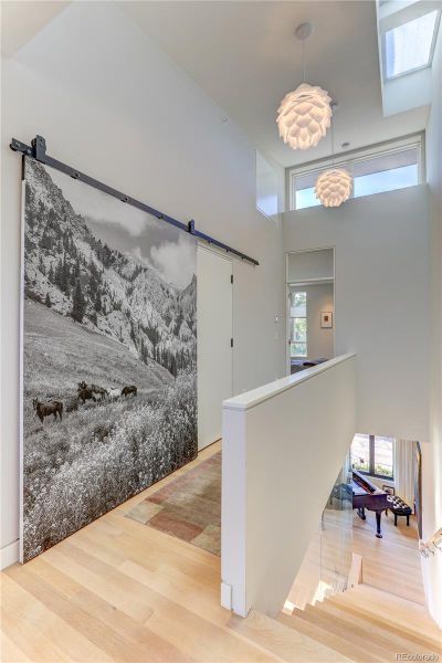 Sleeping Level Hallway, *Similar floor plan, finishes and feel at L'Avenir! (Picture is not of the actual build) hallway has white oak floors, convenient upper utility room, 9