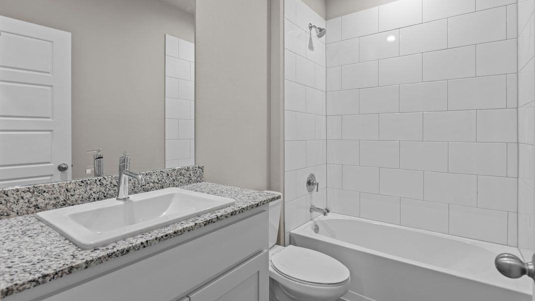 Representative furnished interior of a home built from the NAPLES by D.R. Horton in Homestead at Parks Bell Ranch, Odessa (Image 16).
