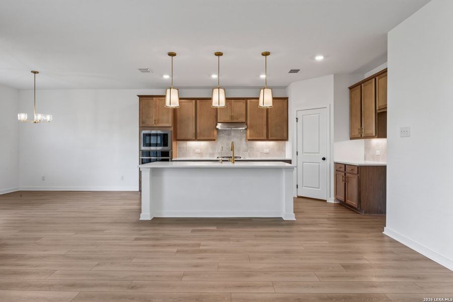 Furnished interior view inside a new home in Nopal Valley, San Antonio (Image 6).