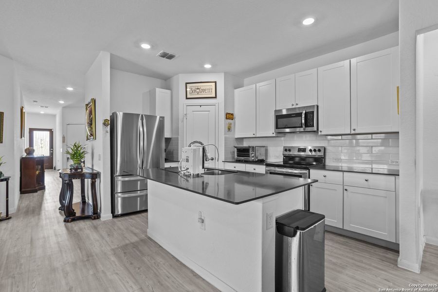 Furnished interior view inside a new home in , San Antonio (Image 11).