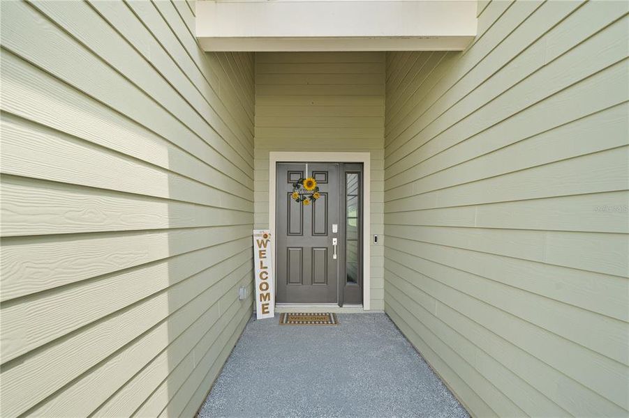 Exterior details and patio area of a home in Trailhead Landing, Alachua (Image 3).