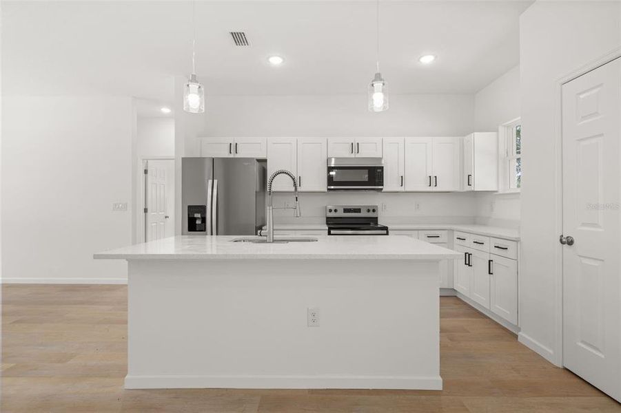 Furnished interior view inside a new home in , Dunnellon (Image 11).