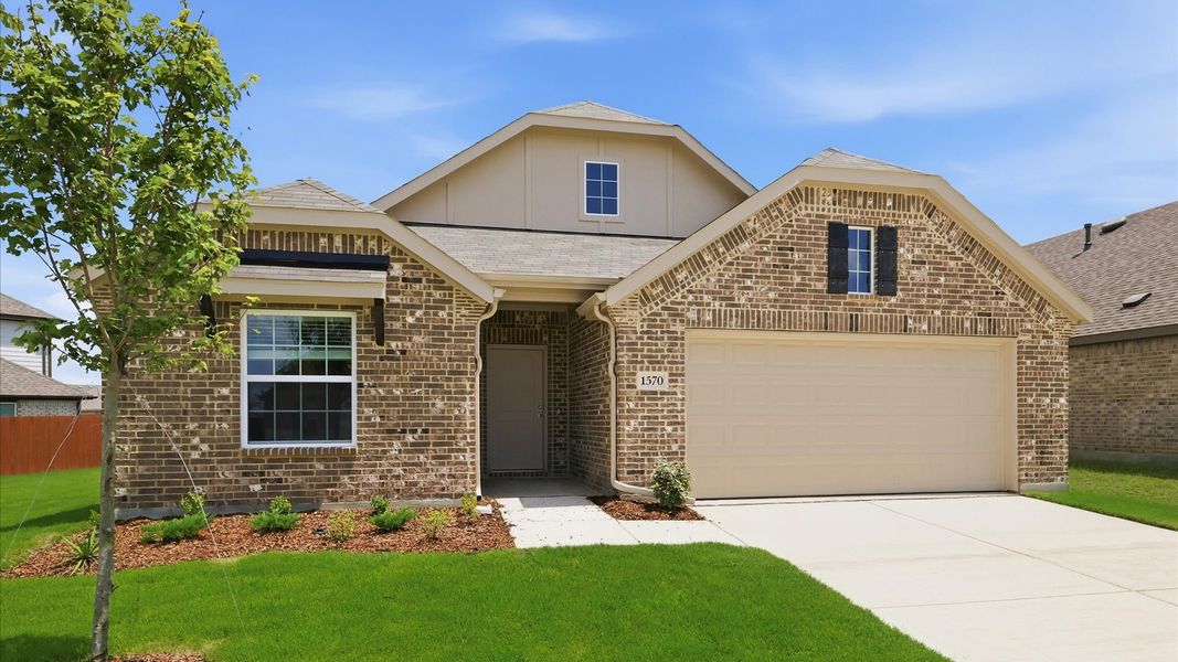 Front exterior of a new home in Walden Pond, Forney, TX, highlighting curb appeal (Image 21). Front exterior of a new home in Walden Pond, Forney, TX, highlighting curb appeal (Image 21).