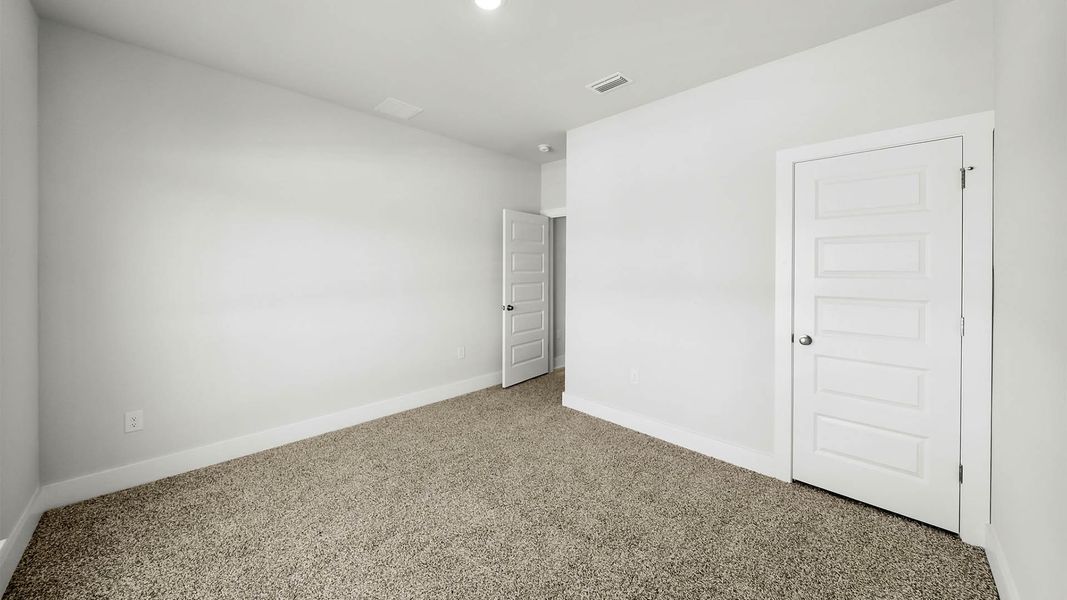 Representative unfurnished interior of a home built from the The Kennedy by D.R. Horton in Titus Park, Panama City (Image 19).