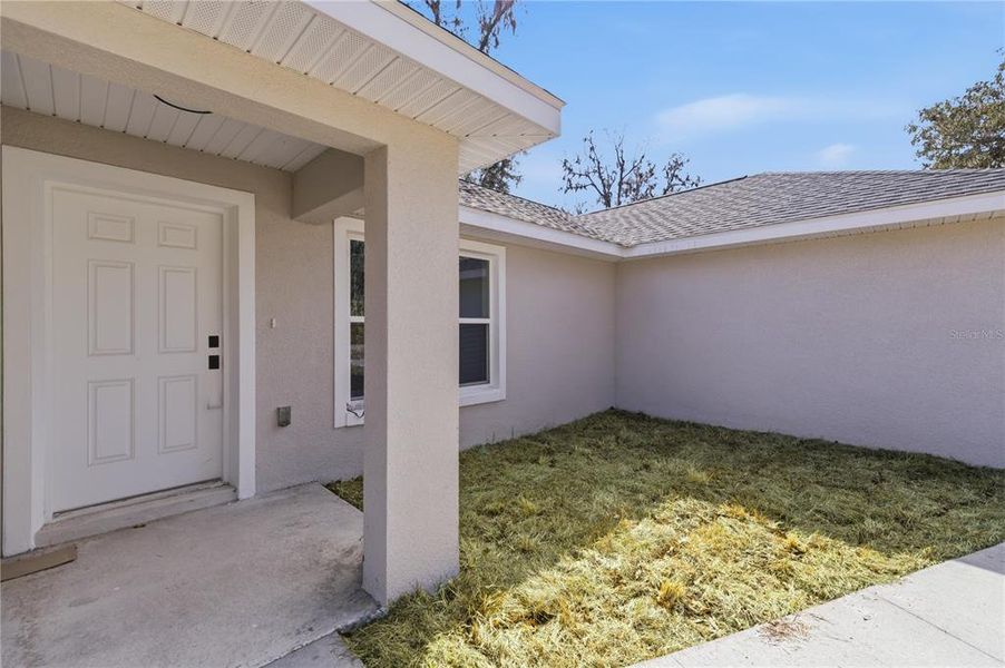 Exterior details and patio area of a home in , Summerfield (Image 17).