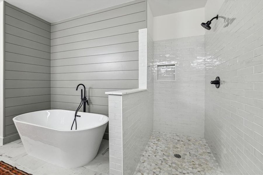 Soak tub and shower whatever your heart desires. * Class shower door and partition have been installed since photoshoot.