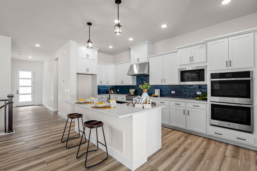Furnished interior view inside a new home in Wolf Ranch - Enclave Collection, Colorado Springs (Image 5). Furnished interior view inside a new home in Wolf Ranch - Enclave Collection, Colorado Springs (Image 5).