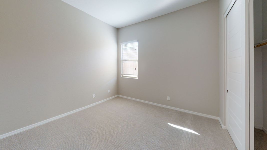 Representative furnished interior of a home built from the Benissa by DRB Homes in Windrose, Waddell (Image 16).