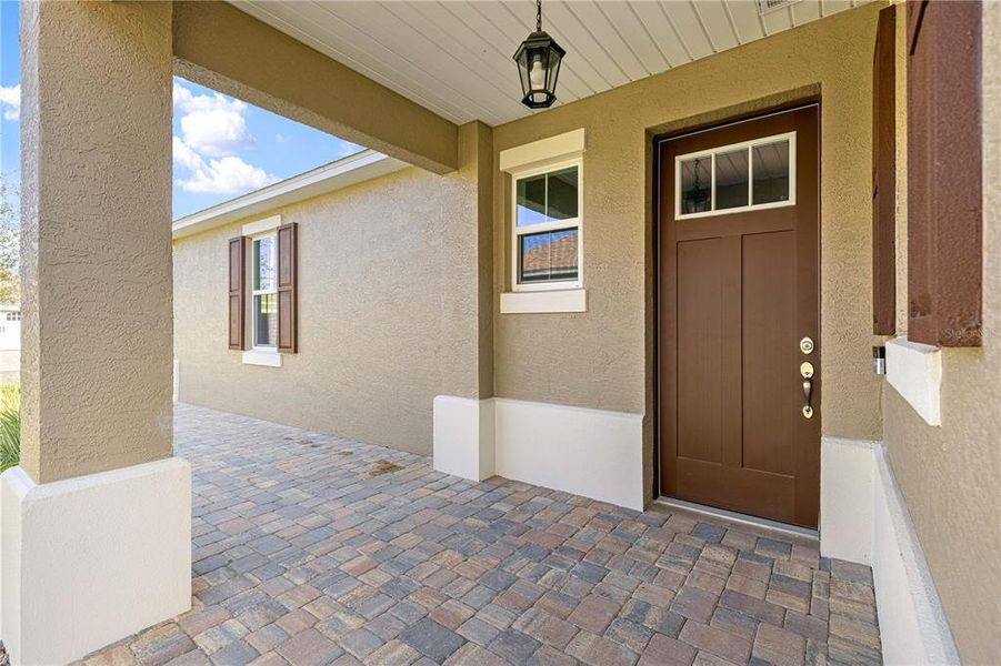 Exterior details and patio area of a home in On Top of the World Communities, Ocala (Image 34).