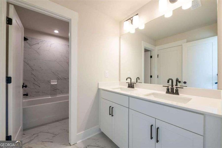 Furnished interior view inside a new home in The Paddocks at Doc Hughes, Buford (Image 5).