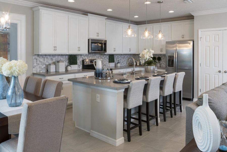 Representative furnished interior of a home built from the Kensington Flex by Risewell Homes in Park View at the Hills, Minneola (Image 7).