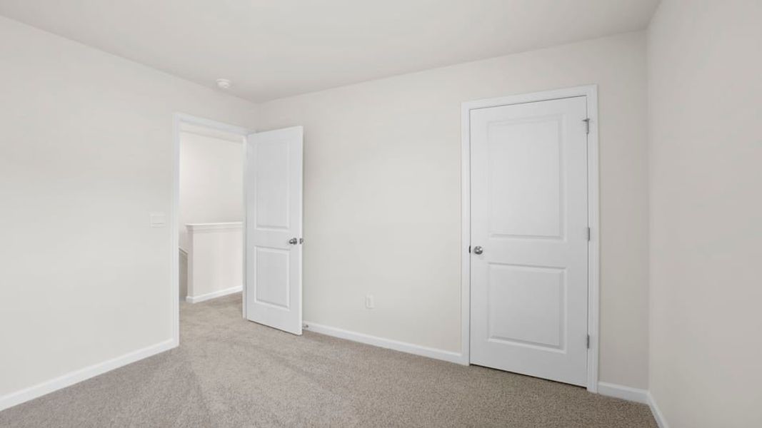 Spacious, unfurnished interior of a new home in Bentley Park, Greenwood (Image 33). Spacious, unfurnished interior of a new home in Bentley Park, Greenwood (Image 33).
