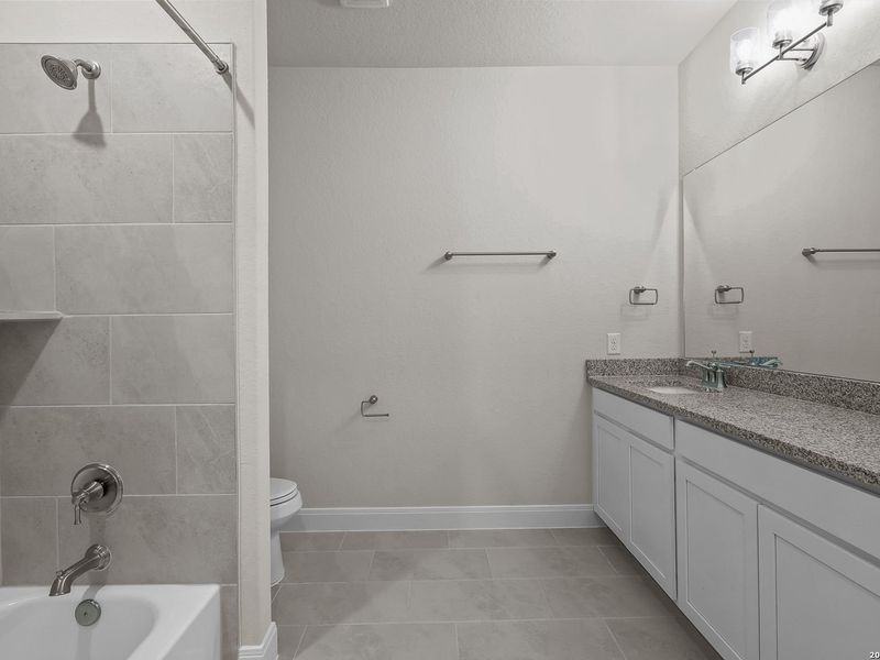 Furnished interior view inside a new home in Ladera, San Antonio (Image 34).