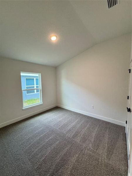 Spacious, unfurnished interior of a new home in Watercress Cove, North Port (Image 12).