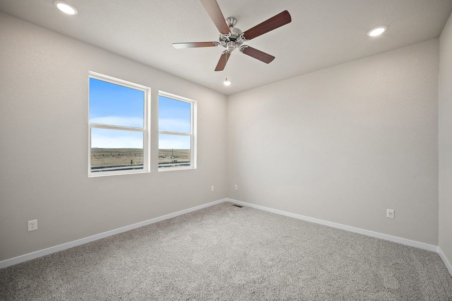 Spacious, unfurnished interior of a new home in Ridge at Lorson Ranch, Colorado Springs (Image 26).