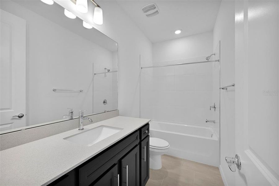 Furnished interior view inside a new home in Seminole Palms, Palm Coast (Image 11). Furnished interior view inside a new home in Seminole Palms, Palm Coast (Image 11).