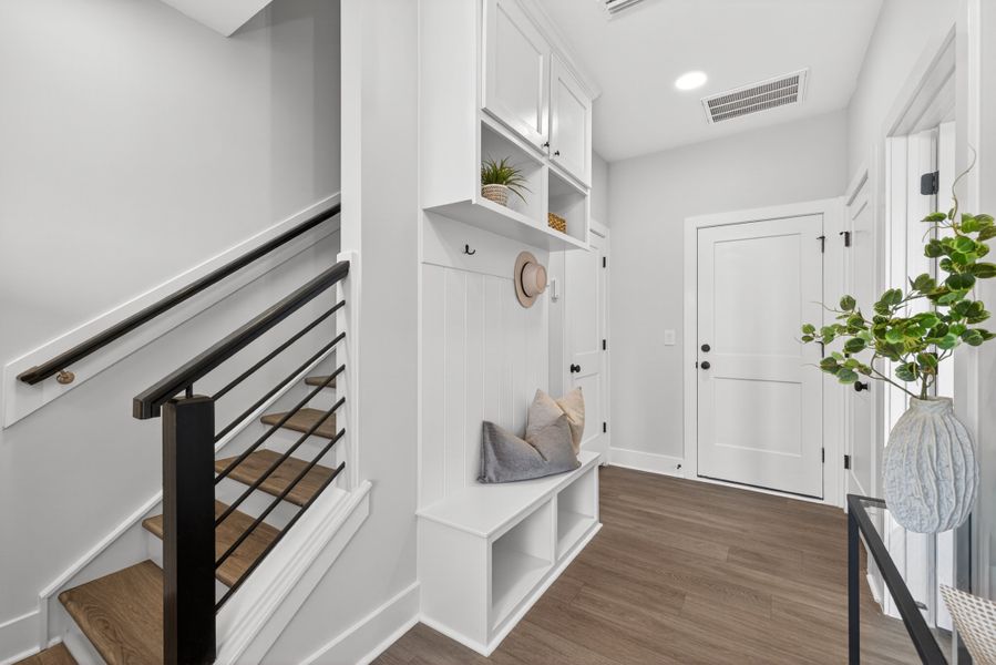 Representative furnished interior of a home built from the Cora End Unit by Baker Residential in Atwater Station - Midtown Collection, Fuquay Varina (Image 22). Representative furnished interior of a home built from the Cora End Unit by Baker Residential in Atwater Station - Midtown Collection, Fuquay Varina (Image 22).