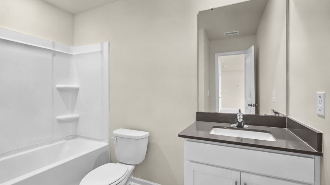 Representative furnished interior of a home built from the COLUMBIA by D.R. Horton in Galvins Ridge, Sanford (Image 8).