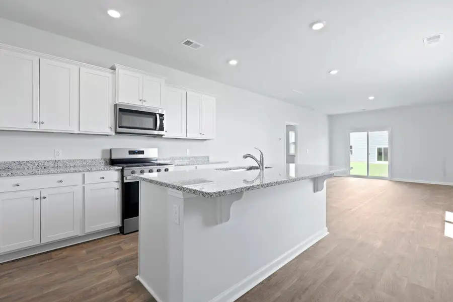 Furnished interior view inside a new home in Pine Hills at Cane Bay, Summerville (Image 2).