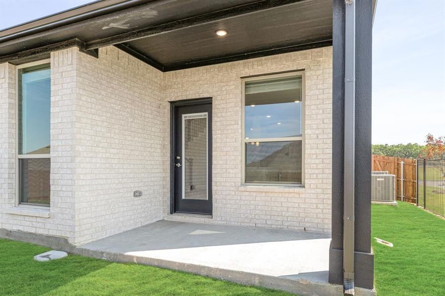 Front exterior of a new home in Parks at Panchasarp Farms 65, Burleson, TX, highlighting curb appeal (Image 22). Front exterior of a new home in Parks at Panchasarp Farms 65, Burleson, TX, highlighting curb appeal (Image 22).