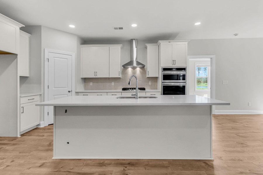 Furnished interior view inside a new home in Tidewater at Lakes of Cane Bay, Summerville (Image 5).