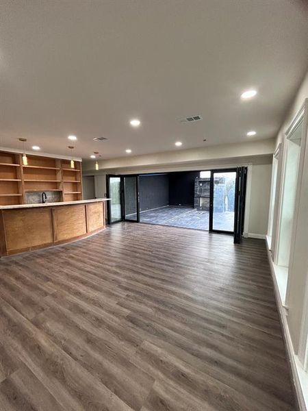 Gameroom with built in bar. Perfect for entertaining.