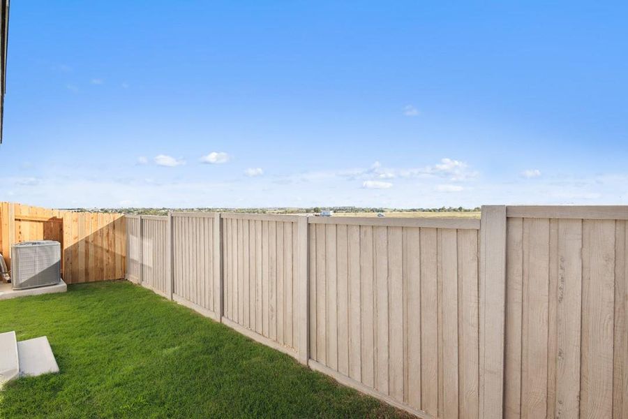 Exterior details and patio area of a home in Park Central, Georgetown (Image 27).
